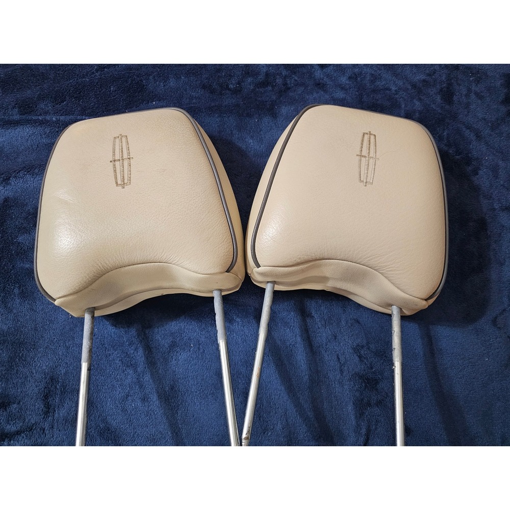 2 beige leather front headrests for a 2007-2010 Lincoln MKX OEM replace.ent